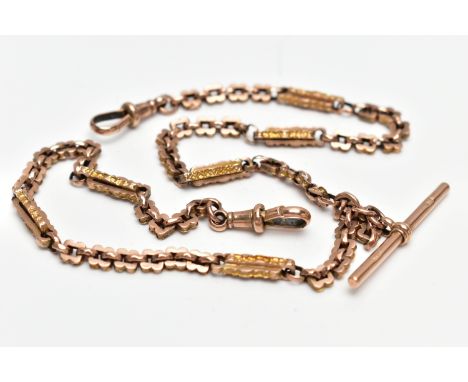 A MID VICTORIAN YELLOW GOLD ALBERT CHAIN, designed as an ornate trombone and feta link chain, with embossed detail, to the lo