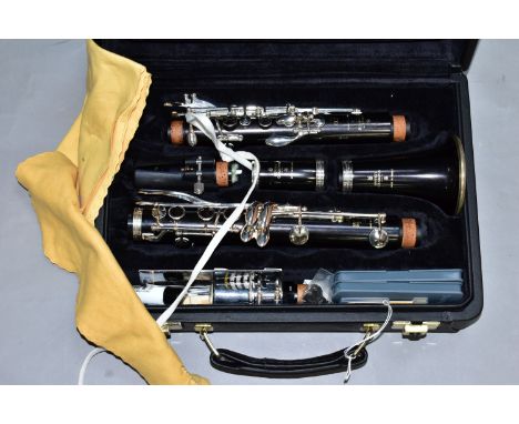 A BUFFET CRAMPTON OF PARIS CLARINET E13, serial No.K290755 with spare B45 mouthpiece, in a velvet lined lockable case, all pa