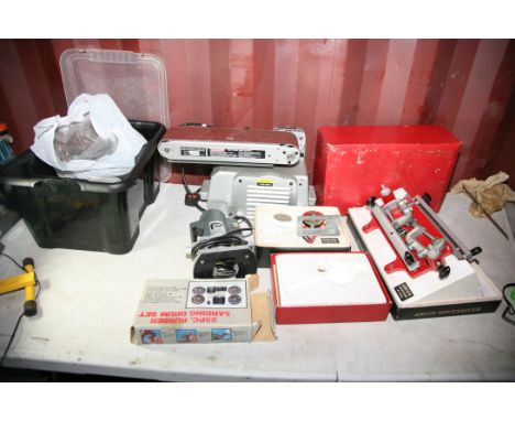 A REXON BD46A BENCH SANDER (no drive belt cover), an Arcoy Rabetter, an Arcoy Dovetail jig (both in boxes), a Performance Rou