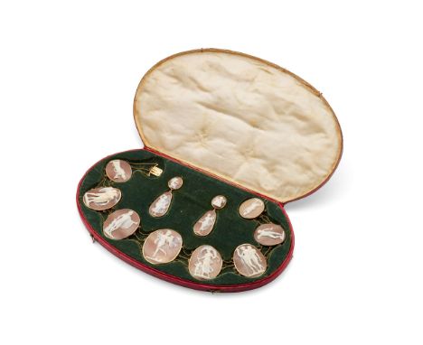  An early 19th century cameo necklace and earring suite  The graduated collet-set oval shell cameos, depicting figures from C
