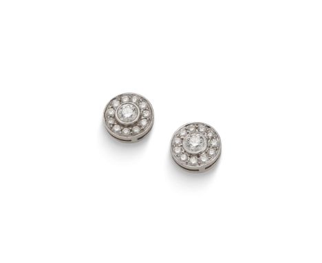  Tiffany & Co.: A pair of 'Soleste' platinum and diamond earstuds  Each collet-set with a brilliant-cut diamond, weighing 0.3