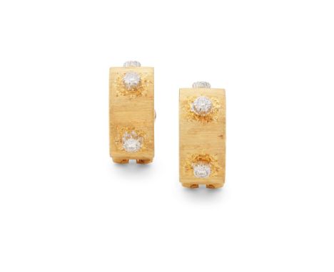  Buccellati: A pair of diamond earrings  Each hoop finely engraved in the rigato style, featuring a trio of collet-set brilli