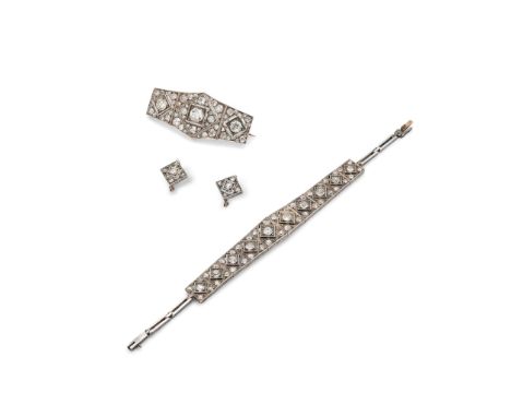  A diamond bracelet, brooch and earring suite  The brooch of tapering form, centrally-set with an old brilliant-cut diamond, 