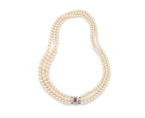  A three-strand cultured pearl necklace with a ruby and diamond clasp  The three graduated strands of 4.6-8.2mm cultured pear
