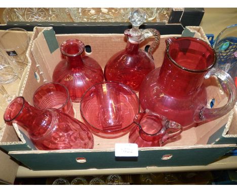 A quantity of Cranberry glass including bowl, vases, decanter, jug, etc.