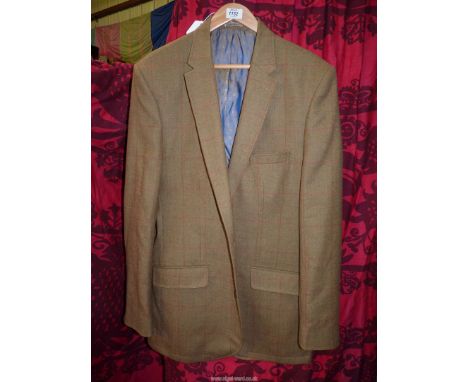 A light weight tweed jacket by Samuel Windsor in a green check. size 42" chest.
