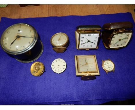 A Tenco electric clock movement, an Oris alarm clock, two travel alarm clocks, square faced alarm clock Lorus Lumibrite day/d