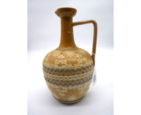 A Doulton Lambeth jug/flask in cream and blue colour-way, 10 1/2" tall.