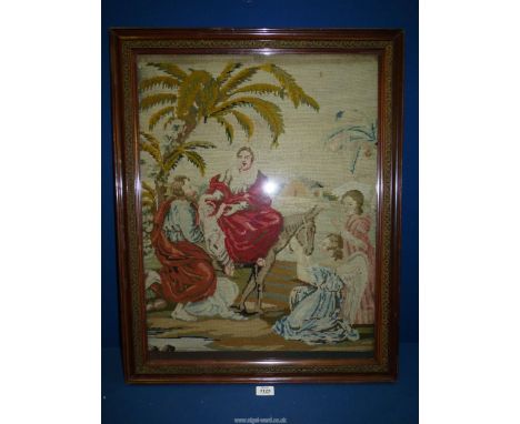A framed and glazed Victorian tapestry, 30'' x 23 1/2''.