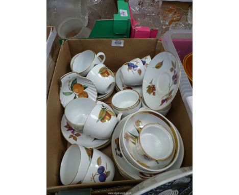 A quantity of teaware Royal Worcester Evesham including bowls,teacups, saucers and flan dishes etc.
