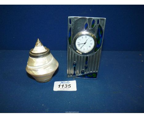 A small Art Nouveau pewter and enamel quartz Clock by A.E. Williams, 4 1/4'' tall together with a small conch shell trinket B