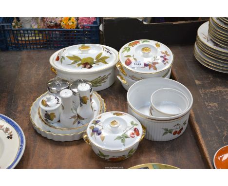 A quantity of Royal Worcester 'Evesham' china  dinner and cookware including lidded serving dishes, flan dishes, coddlers etc