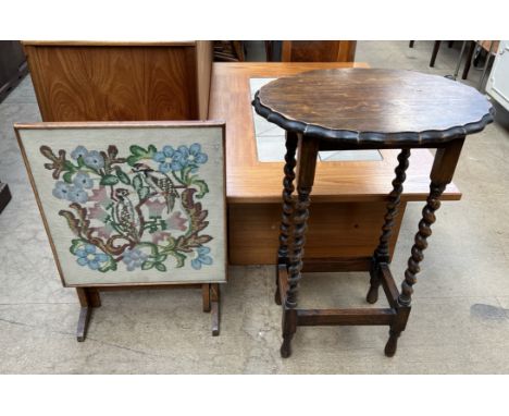 An oak occasional table with barley twist legs together with an embroidered fire screen / table 