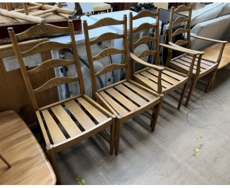 A set of four Ercol elm ladder back dining chairs (includes two carvers)