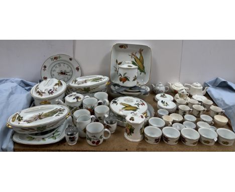 Assorted Royal Worcester Evesham pottery tureens, mugs, jugs etc together with children's tea sets etc