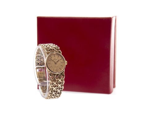 LADY'S OMEGA GENEVE NINE CARAT GOLD MANUAL WIND WRIST WATCH, the oval gold coloured textured dial with applied baton hour mar