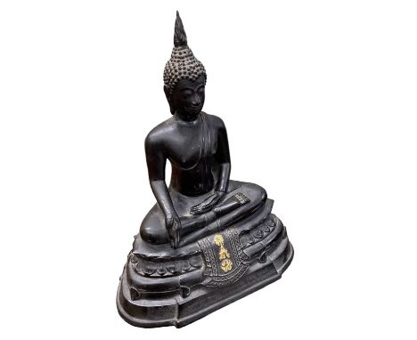 A 20th century bronze figure of Buddha, with inscriptions to plaques on the front and back, height 23cm, width 18cm.