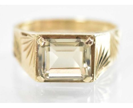 A 9ct yellow gold citrine set gentleman's ring, size R, approx 6.3g.