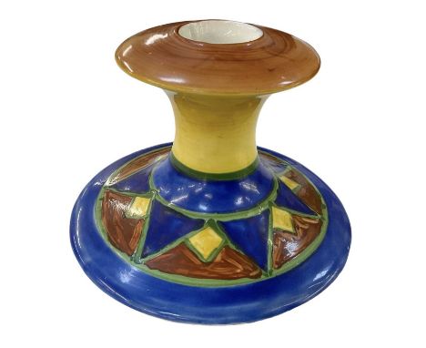 CLARICE CLIFF; a Bizarre hand painted squat candlestick, height 7cm, diameter 11cm.
