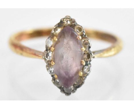 An 18ct yellow gold and platinum amethyst and diamond navette shaped cluster ring, the central amethyst approx 1ct, surrounde