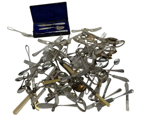 A quantity of silver plated flatware including mother of pearl handled pickle fork, spoon and butter knife, spoons, forks, kn