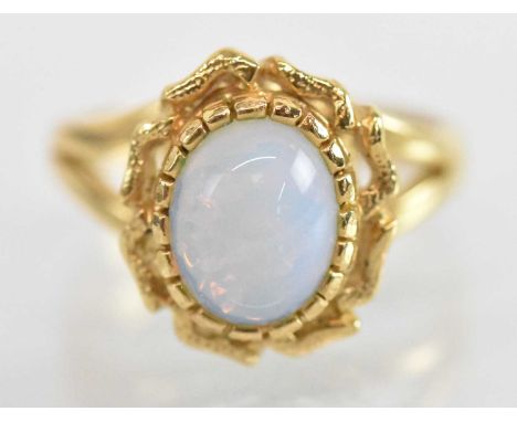 An 18ct yellow gold opal set ring, size N, approx 3.9g.