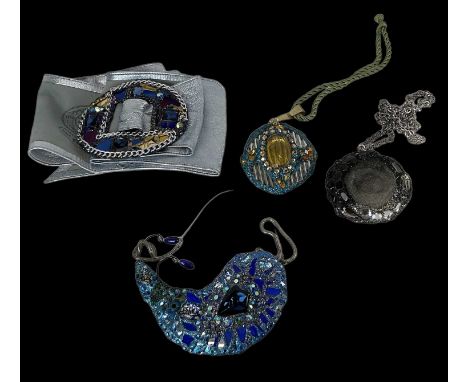 † ANDREW LOGAN; a group of costume jewellery comprising a Zandra Rhodes belt, signed and dated 1987 to the reverse of the buc
