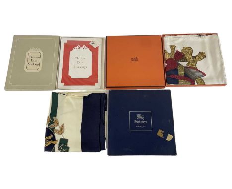 HERMÈS; a 100% silk scarf, a Burberry silk square scarf and a pair of Christian Dior stockings (3).