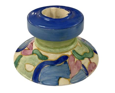 CLARICE CLIFF; a 'Blue Chintz' pattern squat candlestick, height 5cm, diameter 9cm.