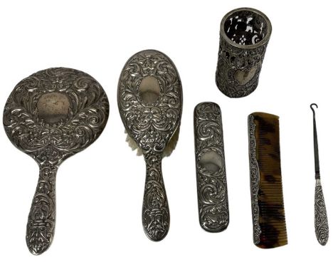 A quantity of hallmarked silver dressing table brushes and mirrors including brush, handled brush, hand mirror, dressing tabl
