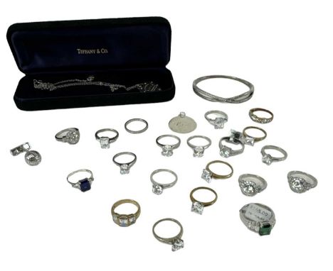 A group of twenty hallmarked silver dress rings, a 925 hallmarked silver Pandora bangle, 925 hallmarked silver Dunhill cuffli