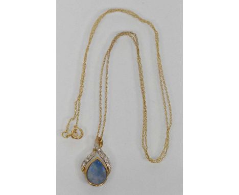 A 9ct yellow gold opal and diamond set pendant, suspended on a 9ct yellow gold fine link necklace, length approx 40cm, combin