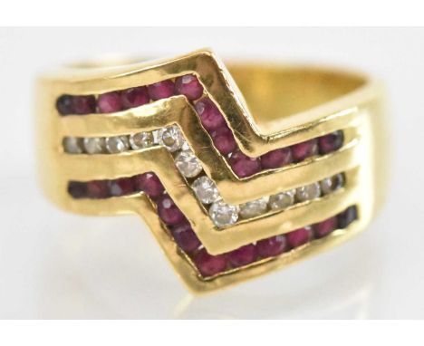 An 18ct yellow gold ruby and diamond set ring, size M, approx 7.4g.
