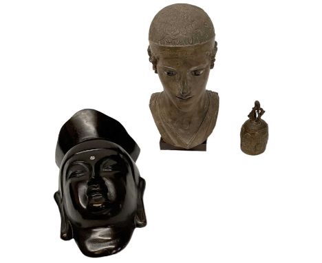 A modern Chinese style wall hanging mask set with small white stone to the forehead, height 20cm, a small Indian style bronze