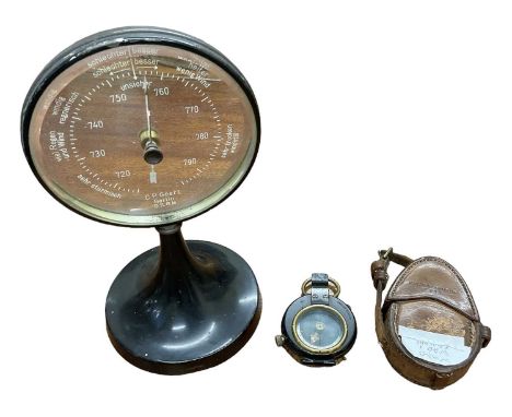 T COOKE &amp; SONS LTD; a WWI issue no. 43751 1916 compass, in leather outer casing, and a German C P Goerz barometer (2).