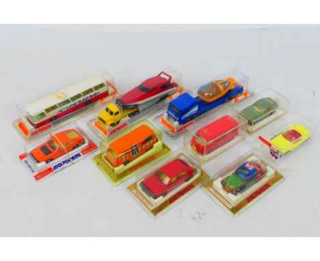 Majorette - A group of 10 x boxed vehicles including Volkswagen Bus, Datsun 260Z, Volkswagen Beetle, Air France coach and sim