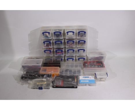Kyosho - Others - A large group of small tools and parts vital for the maintenance and upkeep of a RC model car collection, a
