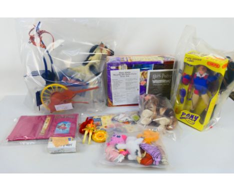 Digimon - Mattel - Harry Potter - A small group of collectable toys, an unboxed action figure and soft toys. Lot includes a M