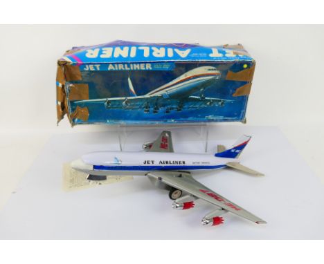 A boxed tin plate ME-087 battery operated aircraft model. The China-made model comes with instruction manual. Aircraft model'