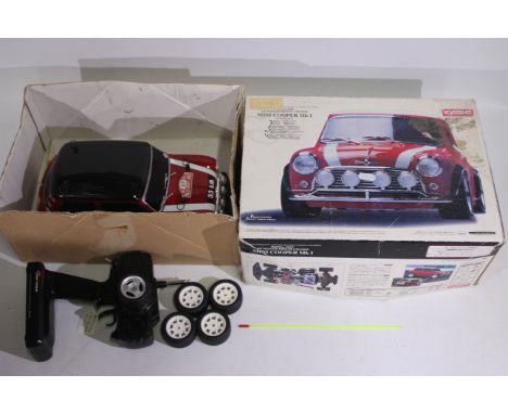 Kyosho - A boxed Kyosho #31741 1:10 scale nitro RC Petit Ten Size GP Mantis Mini FF Chassis 'Mini Cooper Mk.I'. The model is 