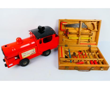 Tri-ang - A Tri-ang Puff Puff steam locomotive and a small wooden cased hobby tool set. The train appears in Fair condition w