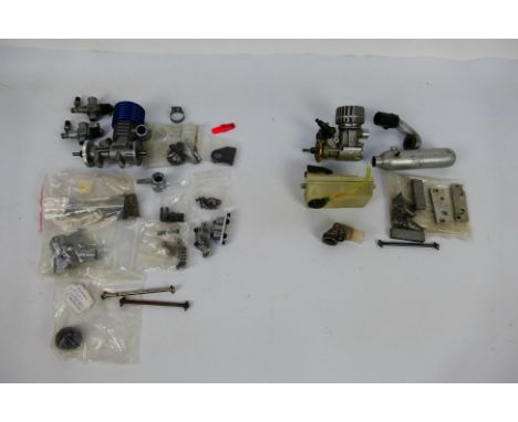 Kyosho - Picco- Two unboxed RC nitro engines. Lot consists of a Kyosho GS21 engine with a quantity of loose parts; together w
