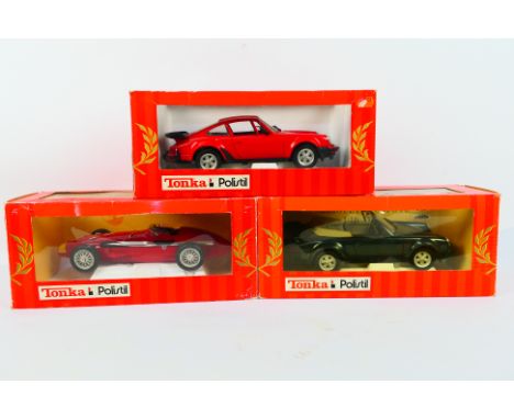 Tonka Polistil - Three boxed 1:16 scale diecast model cars from Tonka Polistil. Lot consists Tonka Polistil Porsche Turbo 911