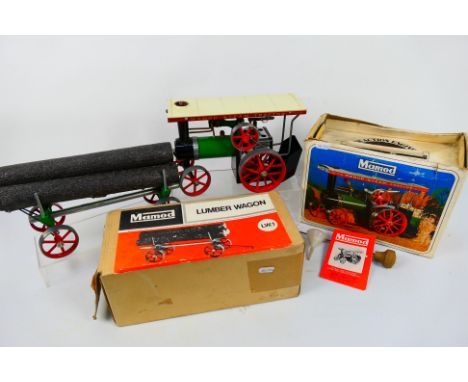 Mamod - 2 x boxed models, a Steam Tractor T.E.1a # R6610 and a Lumber Wagon LW.1 # R6611. They show some signs of use and hav