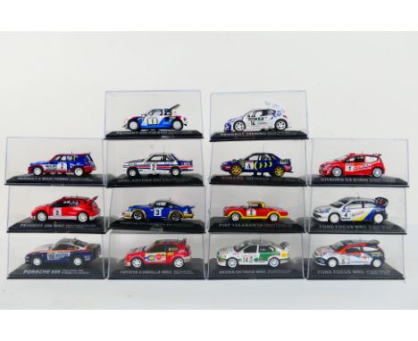 DeAgostini - 14 boxed diecast 1:43 scale model cars from the DeAgostini 'Rally Car Collection'. Lot includes Porsche 911 Carr