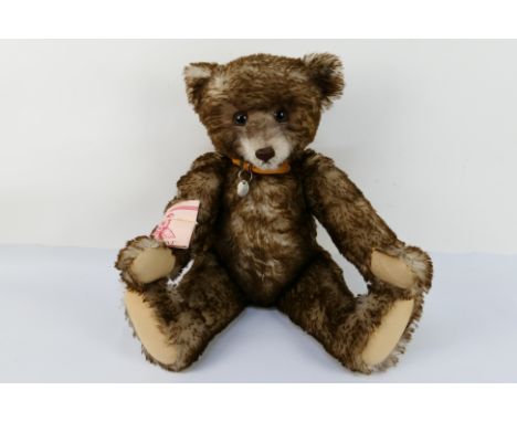 Steiff - A limited edition mohair Steiff bear named Happy. The replica '1926 Happy Anniversary' bear is jointed with stitched