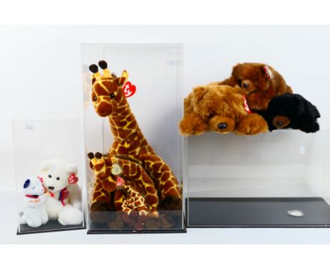 Ty Beanies - A menagerie of Ty Beanies housed within three perspex display case. Lot includes Ty Classic Paws; Ty Beannie Bud