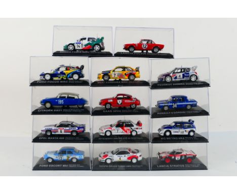 DeAgostini - 14 boxed diecast 1:43 scale model cars from the DeAgostini 'Rally Car Collection'. Lot includes Ford Escort MkI 