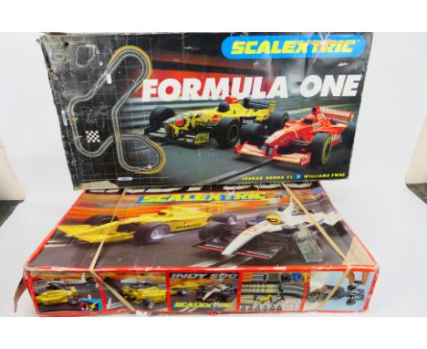 Scalextric - Two boxed Scalextric sets. Lot consists of an Indy 500' set together with a 'Formula One' set. Both sets come wi
