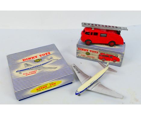 Dinky - 2 x boxed models, a Commer Fire Engine # 955 and  a De Havilland Comet Airliner # 702. The Fire Engine appears Very G